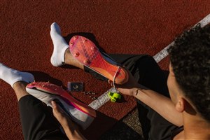 athlete sprint spikes track photography